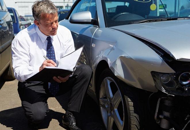 insurance broker explaining coverage benefits to a client